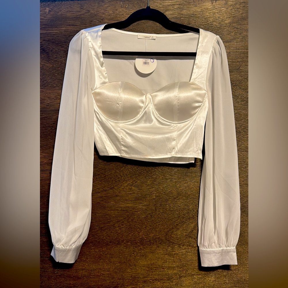 Women’s top , new with tags. Size medium
